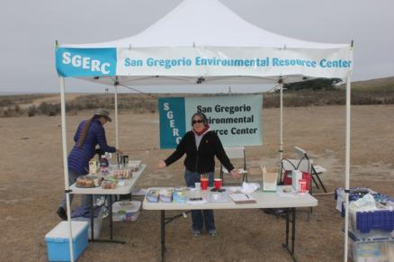 The SGERC tent at a previos year's beach cleanup - there's a nice array of snacks.